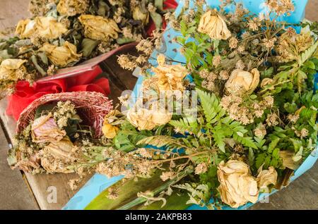 Bouquet of dried roses  on table Stock Photo