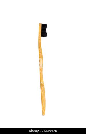 Bamboo toothbrush on white background Stock Photo - Alamy