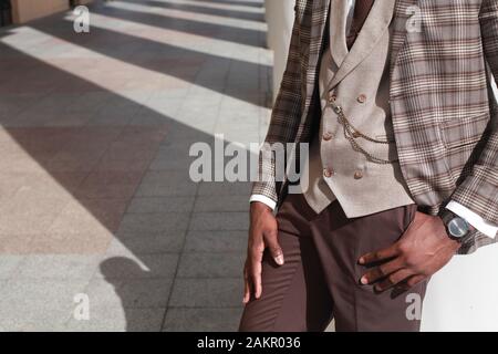 Punctuality concept.  businessman checking time on his wristwatch. men's hand with a watch. Stock Photo