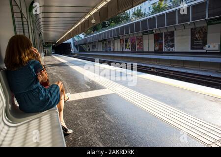 Vienna, Austria - 01 September, 2019 Woman on the subway waiting for the train Stock Photo