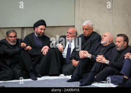 Tehran, Iran. 9th Jan, 2020. This handout picture provided by the office of Iran's Supreme Leader Ayatollah Ali Khamenei on January 9, 2020, shows Iraqi leader of the Hashed al-Shaabi paramilitary force Faleh al-Fayyad (C) alongside Iranian Foreign Minister Mohammad Javad Zarif (2nd-R) and Iraqi Shiite Muslim leader and head of Hikma party Ammar al-Hakim (2nd L) attending a mourning ceremony held by the supreme leader in Tehran for slain top general Qasem Soleimani. Credit: Khamenei.Ir/ZUMA Wire/Alamy Live News Stock Photo