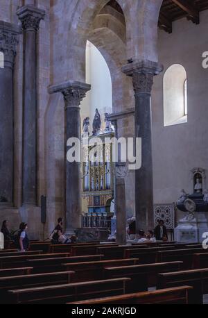 Benches in Basilica Cathedral of Transfiguration in Cefalu city and comune located on the Tyrrhenian coast of Sicily, Italy Stock Photo