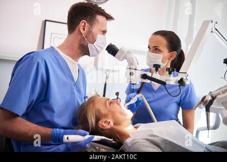 Conversation between two dentist in dentist's clinic Stock Photo