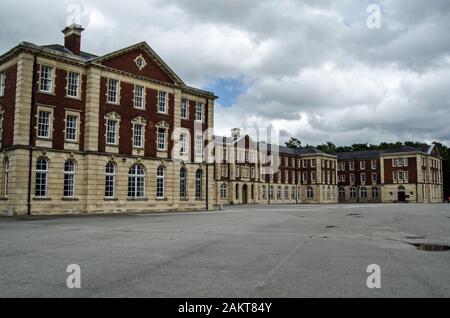 Wing of the Victorian New College buildings at the Royal Military Academy in Sandhurst where officers for the British Army are trained. Stock Photo