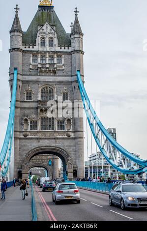 London / United Kingdom - April 21, 2016 : Morning traffic over Tower Bridge London, United Kingdom Stock Photo