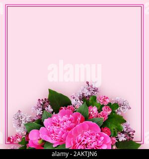 Pink peony, hawthorn and lilac flowers arrangement on pink background Stock Photo