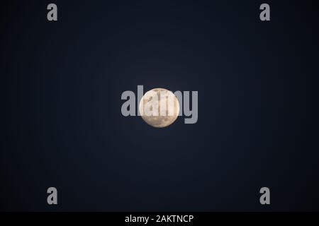 Full moon on dark sky at night. Stock Photo