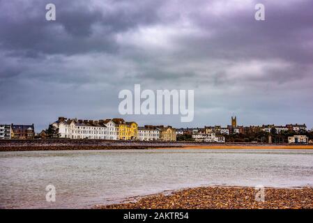 EXMOUTH, DEVON, UK - 5MAR2019: The Georgian houses of Morton Crescent on The Esplanade and Holy Trinity Church. Seen from Dawlish Warren. Stock Photo