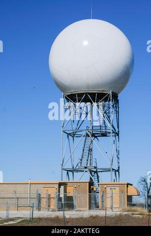 US NOAA weather service radar radome cover. On support tower with radar and communications equipment buildings below. Located in central Texas Stock Photo