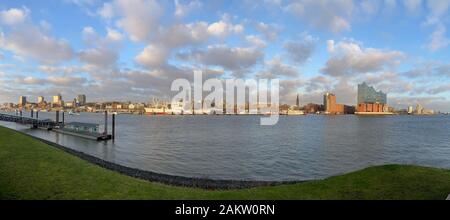 Hamburg, Germany. 31st Dec, 2019. Panoramic view from the pier 'Theater im Hafen (Stage-Theater) on the Norderelbe and the urban side of the Elbe with the Elbe Philharmonic (r) as well as the development with the church St. Michaelis (Michel) to the museum ship Cap San Diego, the hotel 'Hafen Hamburg' and the landing stages. Credit: Soeren Stache/dpa-Zentralbild/ZB/dpa/Alamy Live News Stock Photo