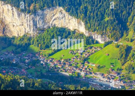 Lauterbrunnen valley, waterfall and mountains Swiss Alps, Switzerland aerial autumn view in Jungfrau region Stock Photo