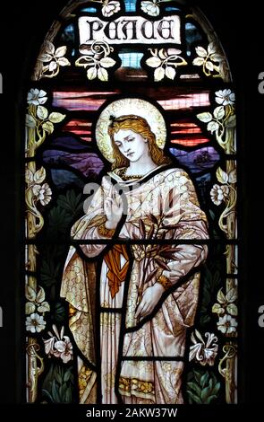 Stained Glass window depicting Peace - woman nimbed surrounded by flowers Stock Photo