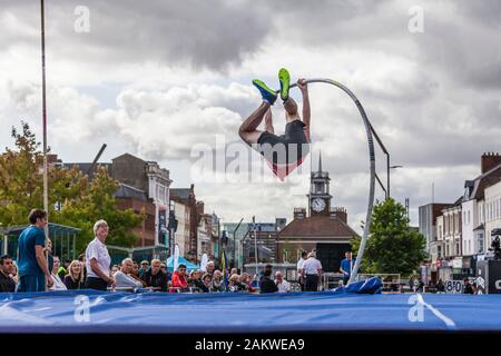 The Great North City Games were held in the High Street ,Stockton on Tees,England,UK, A male pole vaulter in action Stock Photo