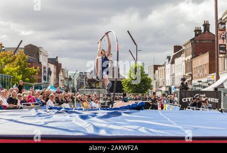 The Great North City Games were held in the High Street ,Stockton on Tees,England,UK, A male pole vaulter in action Stock Photo