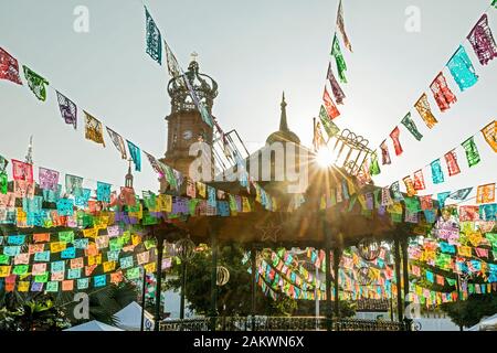 Mexico, Puerto Vallarta, Jalisco, bandstand decorated for a festival at sunrise Stock Photo