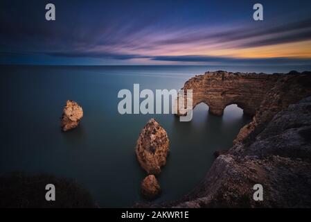 Photo of the coastline of Portugal at the sunset time Stock Photo