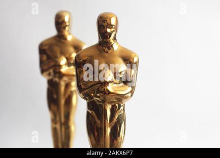 Golden award or trophy on white background. Success and victory concept, statuette Stock Photo