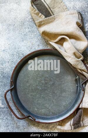 Culinary background with empty plate on a  slate, stone or concrete table. Top view flat lay. Free space for your text. Stock Photo