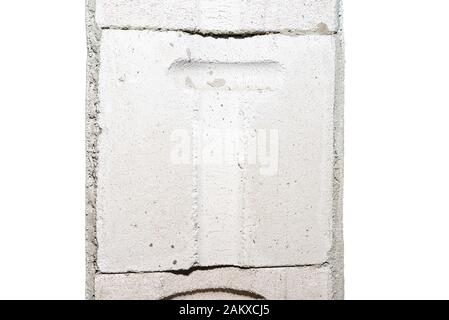 Freshly plastered walls, visible non-plastered bricks in place embedding the door jambs, isolated on a white background with a clipping path. Stock Photo