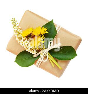 Package wrapped in paper and tied with a rope and bouquet of flowers isolated on white Stock Photo