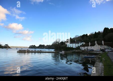 The Pandora Inn at Restronguet Passage, River Fal, Cornwall, England, UK on a calm, peaceful evening Stock Photo