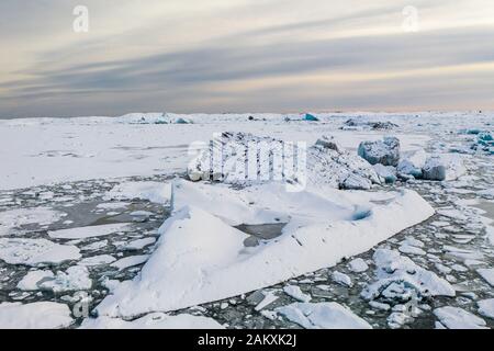 Aerial view of the J kuls rl n glacial lagoon and floating icebergs. The beginning of spring in Iceland Stock Photo