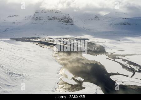 Aerial view of the snow-capped Mount Kirkjufell in early spring in Iceland. Stock Photo