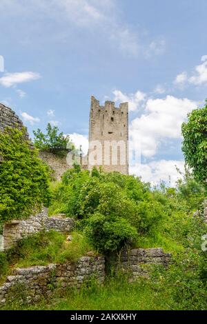 View of a ruined castle tower at Dvigrad (or Due Castelli), an abandoned medieval town in Draga Valley, central Istria, Croatia Stock Photo