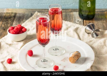 Refreshing Alcoholic Kir Royale with Champagne Raspberries Stock Photo