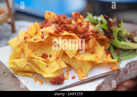 Mexican Crispy Crunchy tortilla chips, snack food made from corn tortillas, which are cut into triangles and then fried or baked. Food Travel, Tourism Stock Photo
