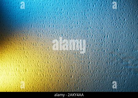Textural background with yellow lights in the corner Stock Photo