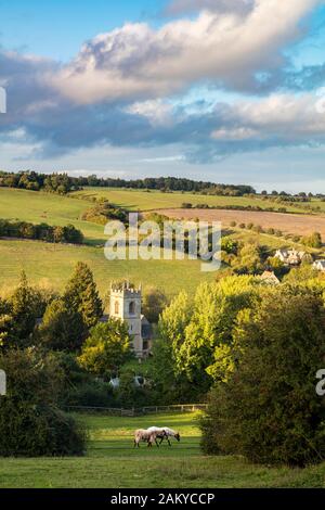 View over 15th Century St Andrew's Church, Naunton, Gloucestershire, England, UK Stock Photo