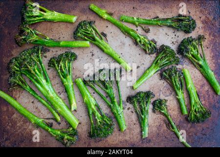 Roasted Broccolini on a Sheet Pan: Green vegetables tossed in olive oil and oven roasted on a sheet pan Stock Photo