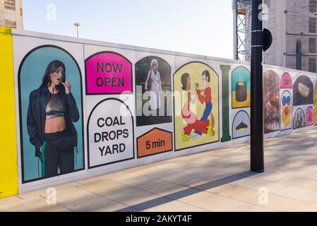 N1C, Coal Drops Yard billboards advertising signs on street. Coal Drops Yard is a unique new shopping quarter at King's Cross, London, UK Stock Photo