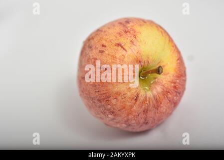 Apple and Lemons with a Pepper thrown in Stock Photo