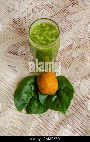 Homemade Spinach And June Plum Juice Stock Photo