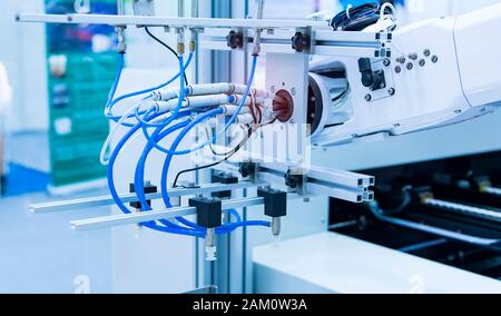 robot arm is working smartly in the production department in artificial intelligence factory Stock Photo