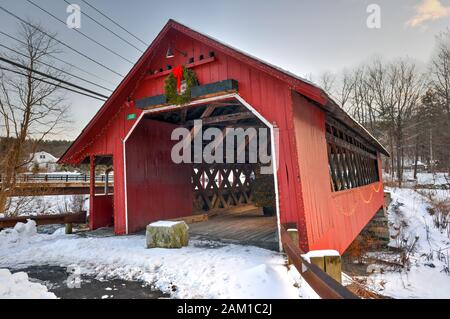 Creamery Covered Bridge in West Brattleboro, Vermont during the winter. Stock Photo