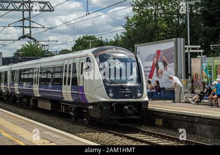 London, UK - June 22, 2019: A Transport for London railway train at Ealing Broadway station on a sunny summer day.  The new service runs from central Stock Photo