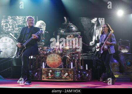 Sunrise, United States Of America. 27th Apr, 2013. SMG Alex Lifeson Geddy Lee Neil Peart FL5 BB&T Rush 042613 23.JPG SUNRISE, FL - APRIL 26 : Alex Lifeson Geddy Lee Neil Peart of Rush performs at the BB&T Center on April 26, 2013 in Sunrise Florida. ( Credit: Storms Media Group/Alamy Live News Stock Photo