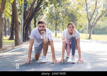 Couples are preparing to run in the morning at the park. Stock Photo