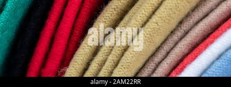 BACKGROUND TEXTURE - Bolts of colourful cloth Stock Photo