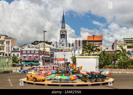 Fort-de-France, Martinique - December 13, 2018: Children's carousel on the square in the city of Fort-de-France, Martinique. Stock Photo