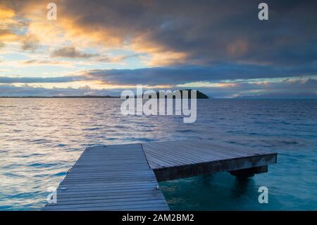 Jetty and Sofitel Private Island at dawn, Bora Bora, Society Islands, French Polynesia Stock Photo