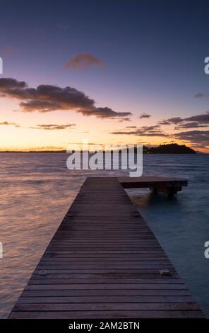 Jetty and Sofitel Private Island at dawn, Bora Bora, Society Islands, French Polynesia Stock Photo