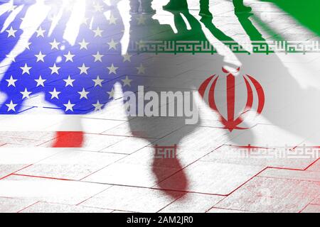 USA and Iran Flags and Shadows of People as Concept Picture Stock Photo