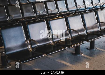 empty seats in waiting lounge on airport Stock Photo