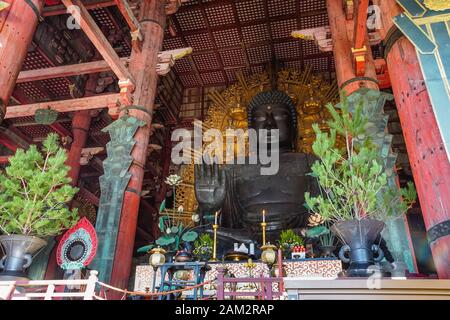 Nara, Japan - December 16, 2019 : The big Buddha statue enshrined in the main chapel of Todaiji temple, this is the most famous travel destinations of Stock Photo