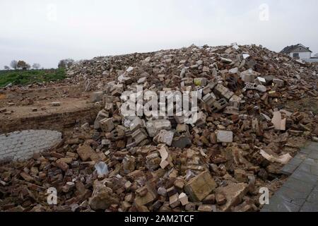 Pile of rubble from demolished buildings in abandoned coal mining town, Mannheim, Germany Stock Photo