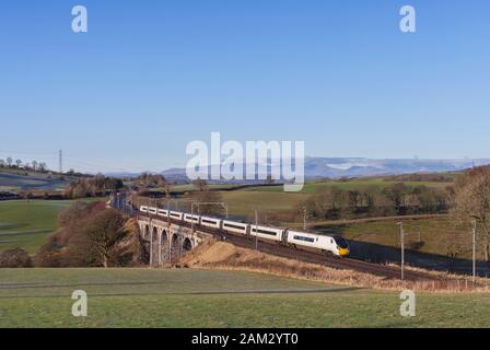 Virgin Trains / Avanti west coast class 390 Alstom  Pendolino train on the west coast mainline in Cumbria Stock Photo